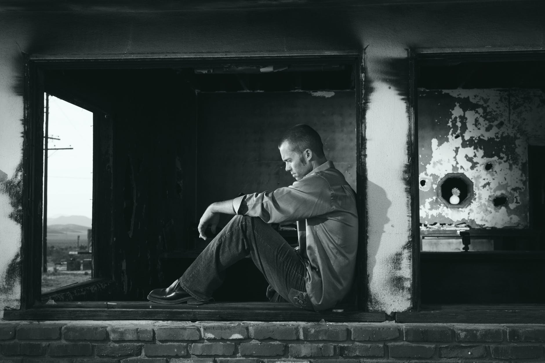 black and white man young lonely